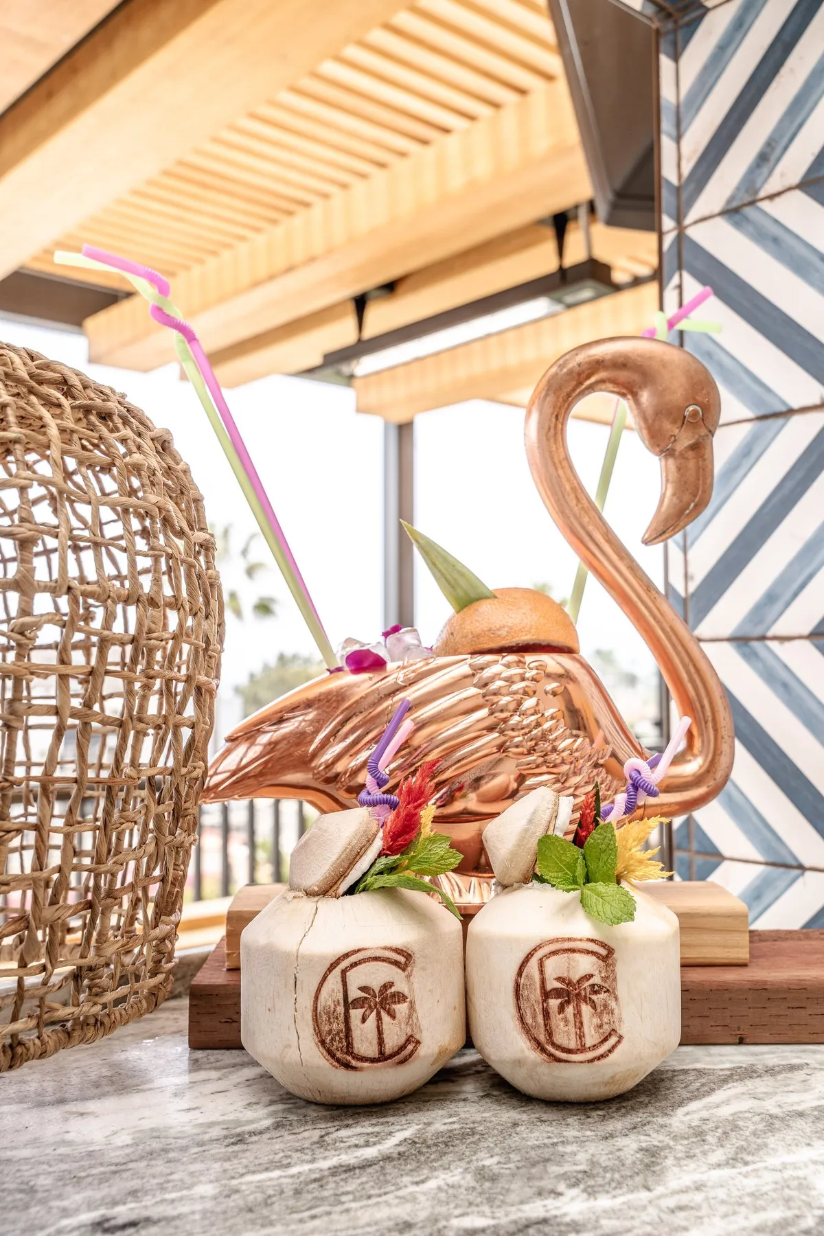 Coco Cabana branded coconut cups with copper flamingo vessel